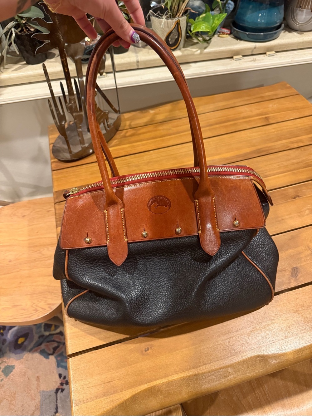 Dooney & Bourke Black Pebbled Leather Satchel with Brown Trim
